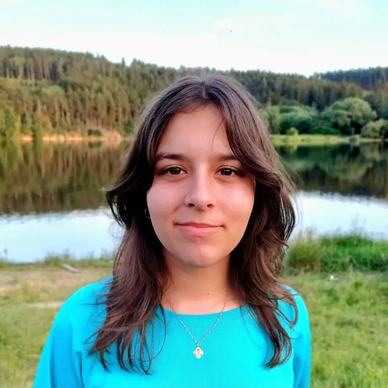 a woman smiling at camera